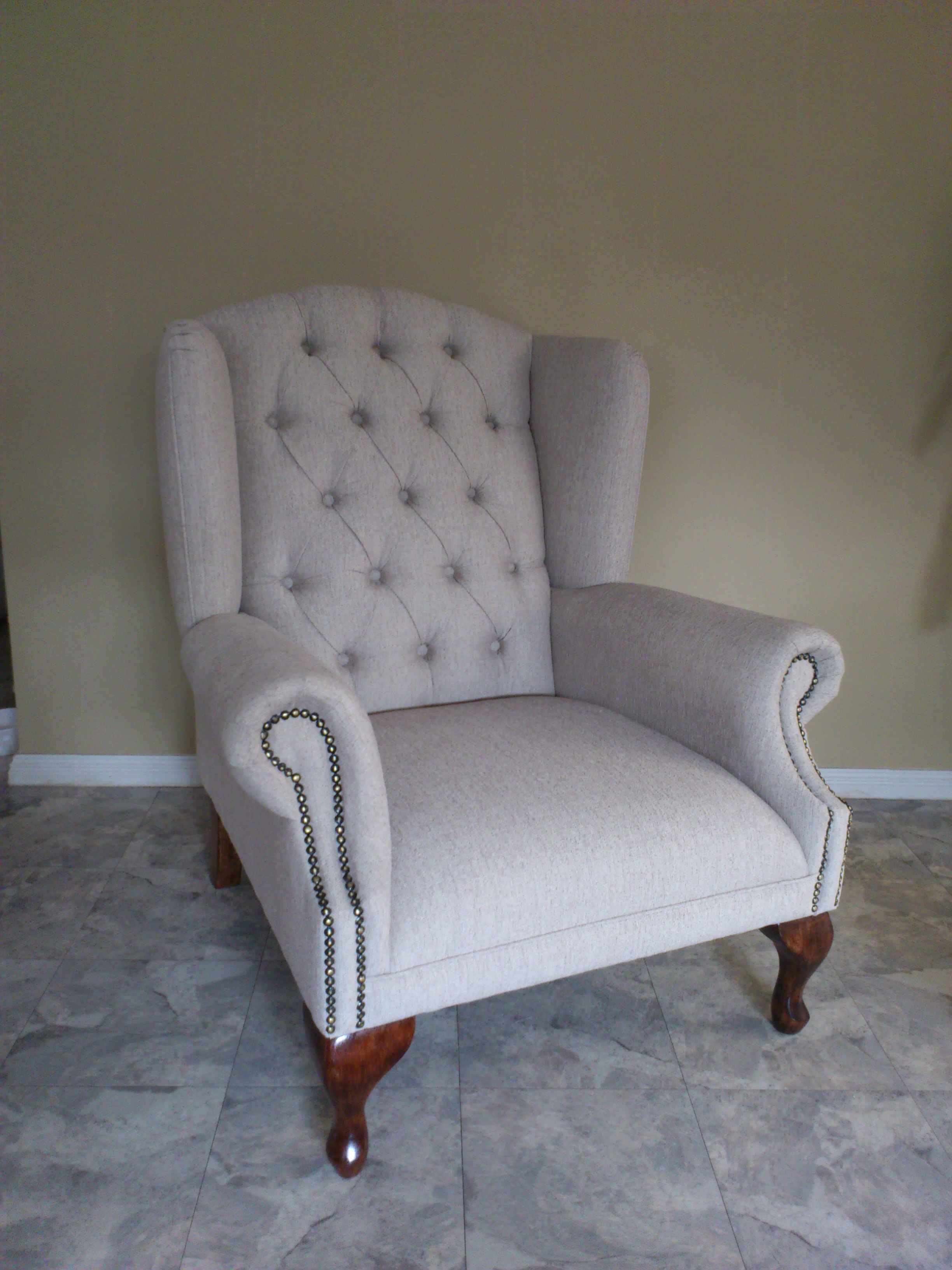Wing chair with studs